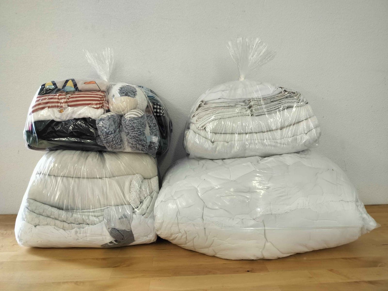 Finished wash-dry-fold orders bagged and ready for pickup