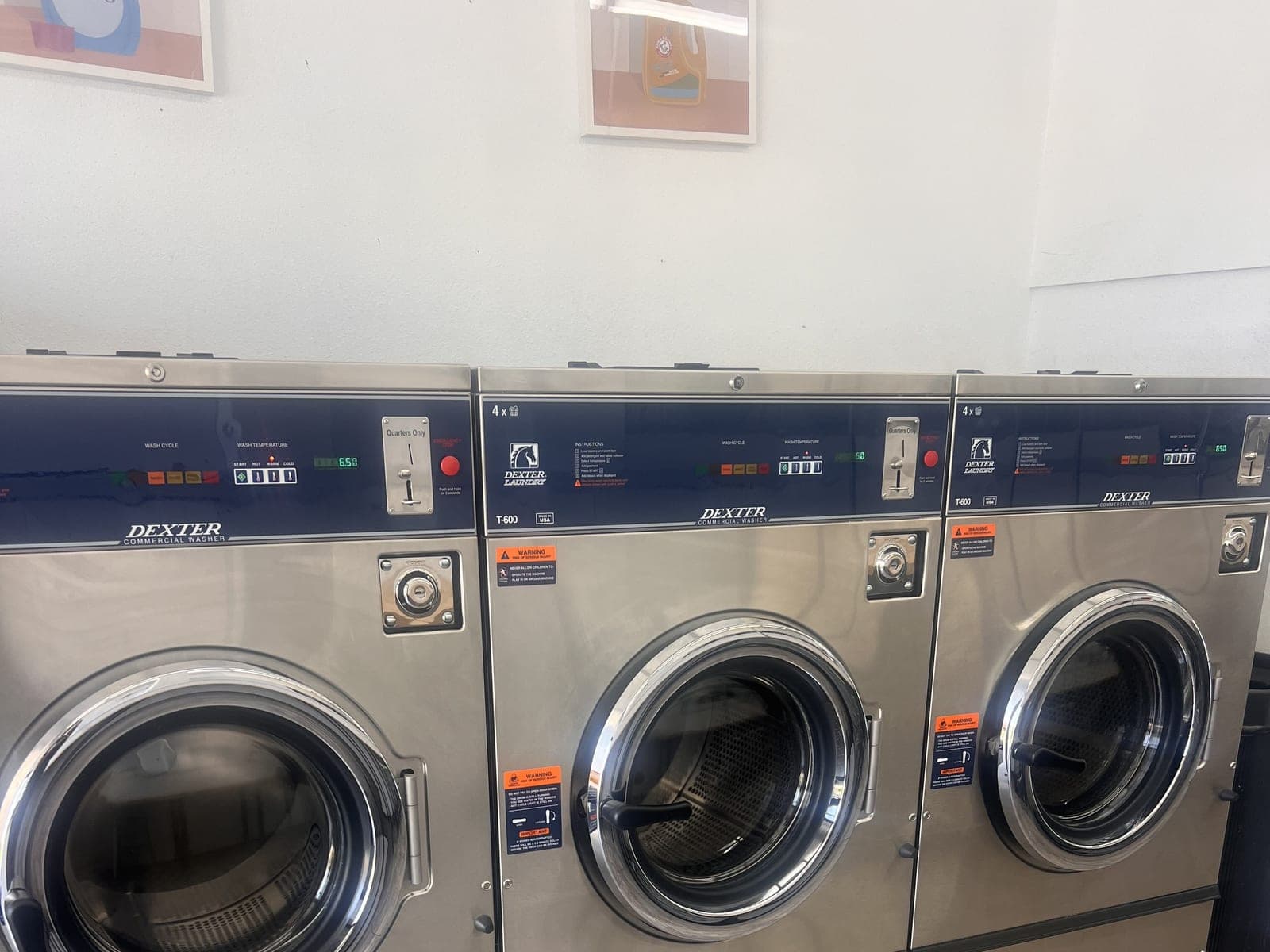 Dexter commercial washers lined up along the wall
